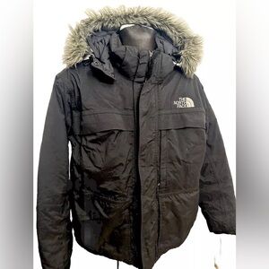 The North Face Men's Black Puffer Jacket with Fur Trim McMurdo Down Hood Puffer.